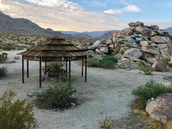 Octagon shelter made of corrugated steel situated in Desert View Conservation Area in Joshua Tree, CA